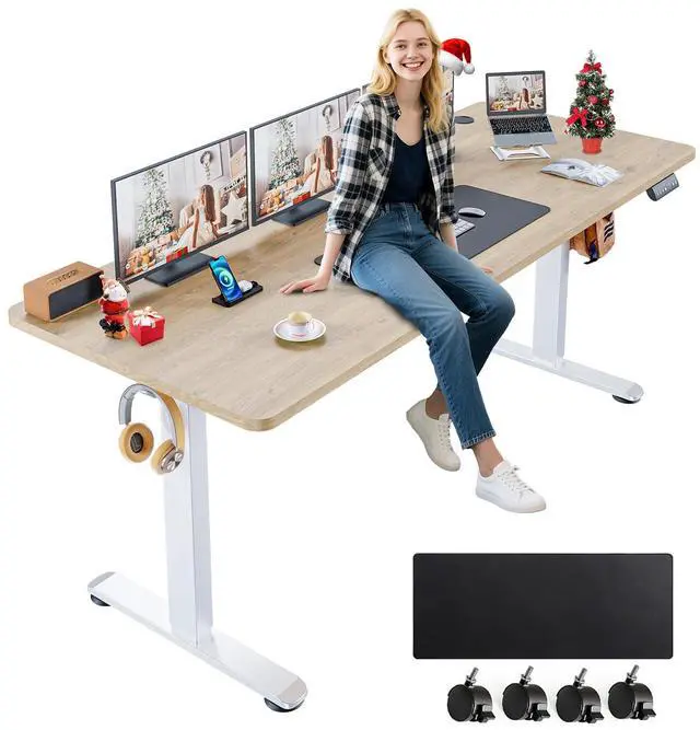 Main image of Electric Standing Desk Adjustable Height, 71 x 28 Inch Sit Stand up Desk with Large Mouse Pad, Double Metal Hook,4 Wheels,4 Memory Preset Heights Home Office Computer Desk,Oak Grey