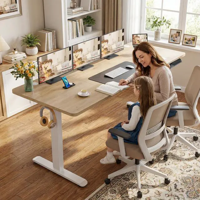 Alt view image 2 of 7 - Electric Standing Desk Adjustable Height, 71 x 28 Inch Sit Stand up Desk with Large Mouse Pad, Double Metal Hook,4 Wheels,4 Memory Preset Heights Home Office Computer Desk,Oak Grey