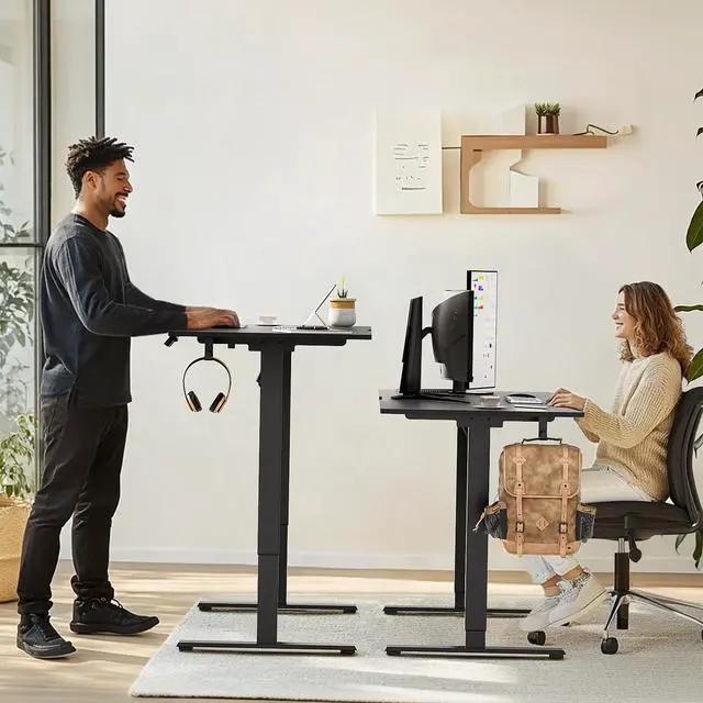 Alt view image 4 of 7 - 63 x 28 Inch Electric Standing Desk with 4 Wheels, Height Adjustable Desk for Home Office, Sit Stand Desk with 4 Memory Presets, Headphone Hooks and Cable Clips, Splice Board Black