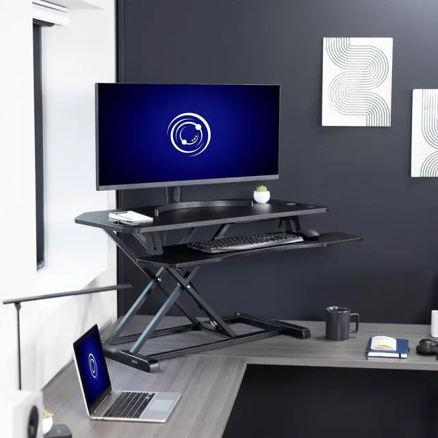 Alt view image 2 of 7 - Extra Wide 38 inch Corner Desk Converter, K Series, Height Adjustable Sit to Stand Riser, Dual Monitor and Laptop Workstation with Wide Keyboard Tray, Black, DESK-V000KL