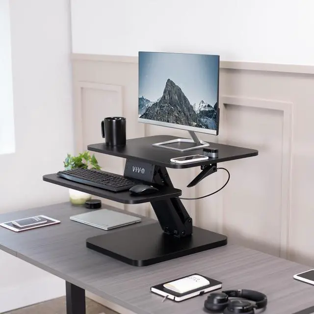 Alt view image 2 of 7 - Black Height Adjustable 25 inch Standing Desk Converter, Compact Sit Stand Tabletop Monitor Riser Workstation, DESK-V001G
