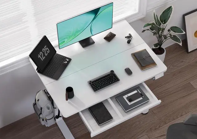 Alt view image 2 of 7 - Electric Standing Desk with Drawer 40 Inch White | Sturdy steel frame supports 176 lbs, 28.35-46.46 inch height range, 3 preset buttons, 45 dB motor, 2 hooks