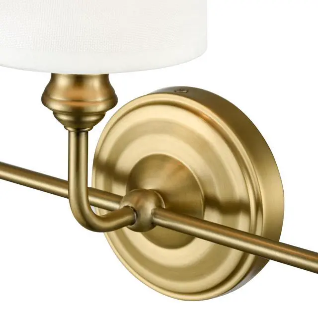 Alt view image 5 of 6 - Leena Collection | 99803-VB | Indoor 3 Light Vanity in Vintage Brass with White Fabric Shade | Elegant and Versatile Design for Any Bathroom