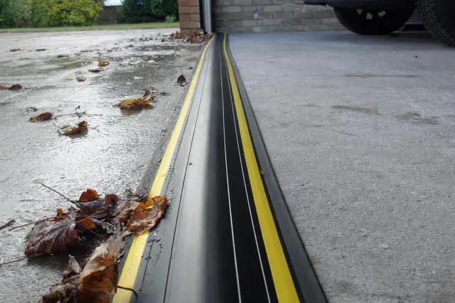 Alt view image 4 of 6 - 1 ½" High Garage Door Flood Barrier Threshold Seal Kit (10'3") | Flexible PVC | Complete Kit Includes 2 Adhesives