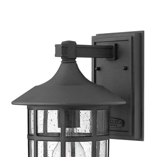 Alt view image 3 of 6 - Freeport Small Outdoor Wall Mount Lantern, New England Design, Cast Aluminum, Clear Seedy Glass, Black