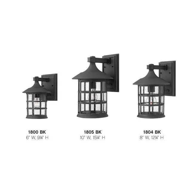 Alt view image 5 of 6 - Freeport Small Outdoor Wall Mount Lantern, New England Design, Cast Aluminum, Clear Seedy Glass, Black