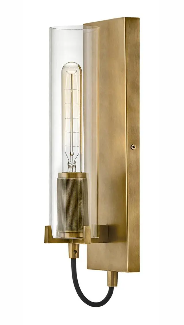 Main image of Ryden Medium Indoor Single Light Wall Sconce, Heritage Brass Finish | Clear Glass Cylinder Shade, Modern Industrial, Sleek, Includes Med. LED Bulb, Shown w/ T-Style Bulb, Hidden Mounting Hardware