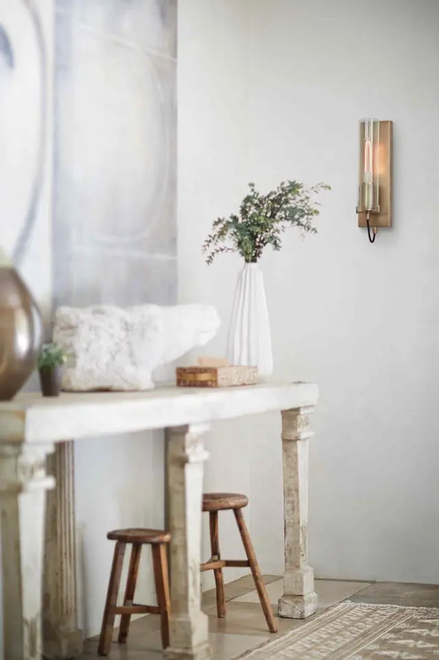 Alt view image 4 of 6 - Ryden Medium Indoor Single Light Wall Sconce, Heritage Brass Finish | Clear Glass Cylinder Shade, Modern Industrial, Sleek, Includes Med. LED Bulb, Shown w/ T-Style Bulb, Hidden Mounting Hardware