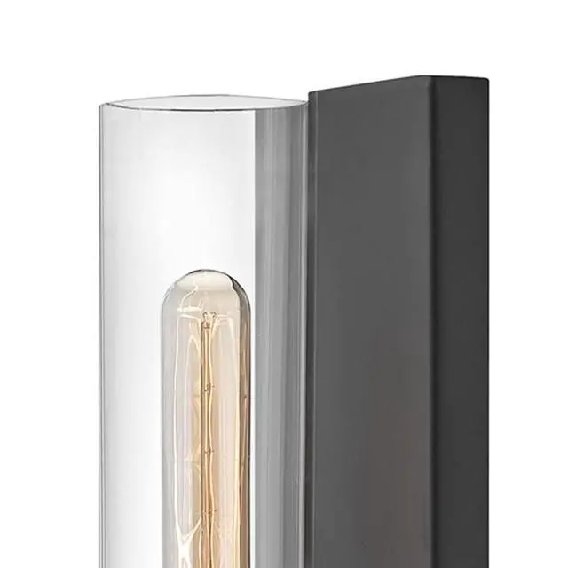 Alt view image 6 of 6 - Ryden Medium Indoor Single Light Wall Sconce, Black Finish | Clear Glass Cylinder Shade, Modern Industrial, Sleek, Includes Med. LED Bulb, Shown w/ T-Style Bulb, Hidden Mounting Hardware