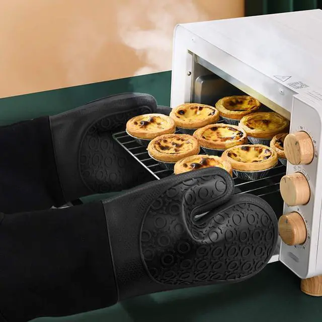 Alt view image 6 of 7 - Extra Long Silicone Oven Mitts, Heat Resistant Oven Gloves with Quilted Liner Non-Slip Textured Grip Perfect for BBQ, Baking, Cooking and Grilling - 1 Pair 14.6 Inch Black