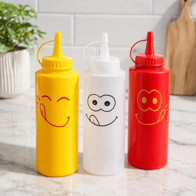 Alt view image 3 of 5 - Condiment Squeeze Bottle Set, 12 Oz, Plastic, Smiley Face Design + Caps, Red, Yellow and Clear, 3-Pack