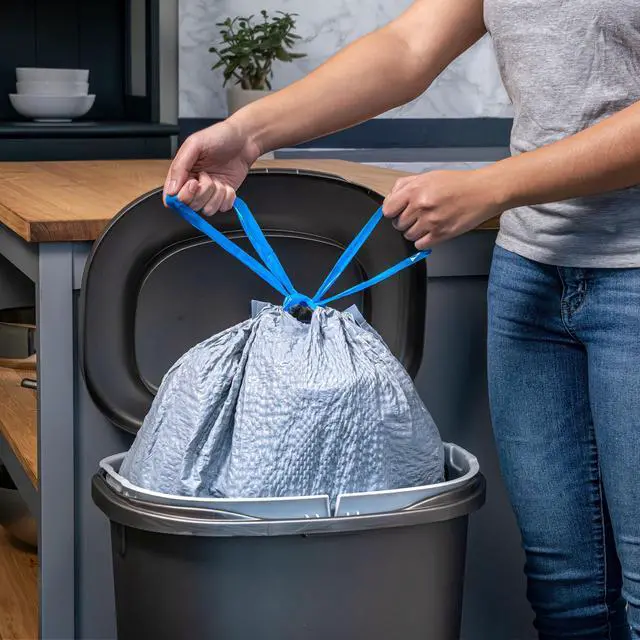 Alt view image 7 of 7 - Ultra Strong 13 Gallon Trash Bags, Tall Kitchen Trash Bags Made with Recovered Materials, Including Coastal Plastic, Drawstring, Resists Leaks and Punctures, Gray, Seaside Breeze Scent, 80 Bags