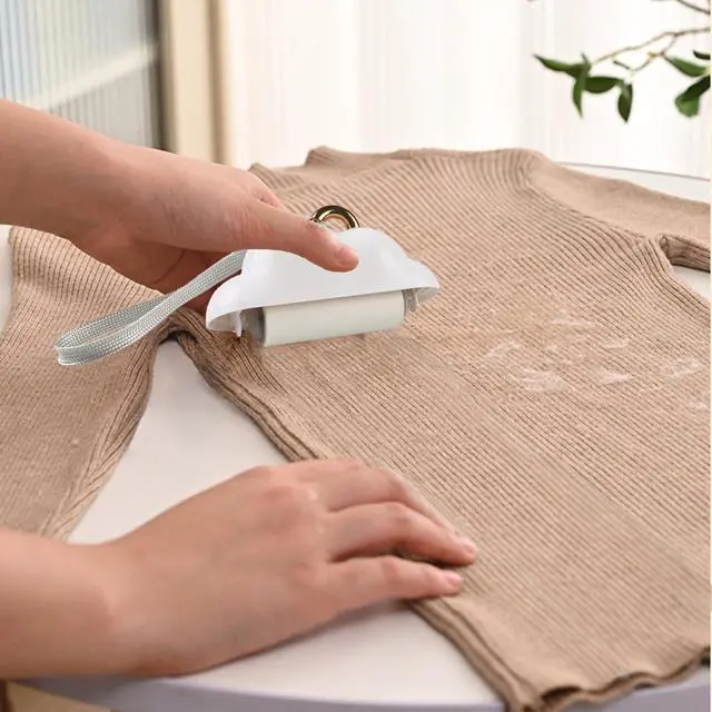 Alt view image 4 of 7 - Mini Travel Lint Roller, Reusable Pet Hair Remover for Clothes with 150 Refillable Sheets (White)