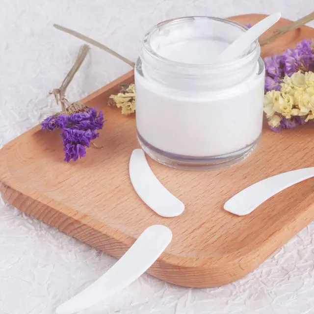 Alt view image 5 of 7 - 100PCS Cosmetic Spatulas, Small Makeup Spatula, Mini Plastic Makeup Scoop for Mixing and Sampling, Skin Care Facial Cream Mask Spatula (White)