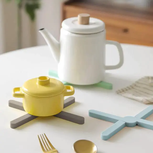 Alt view image 2 of 7 - Foldable Silicone Trivets, 4 PCS Expandable Trivets for Dishes, Hot Pots and Pans Anti-Slip Heat Water Resistant Silicone Hot Pads/Pot Holders