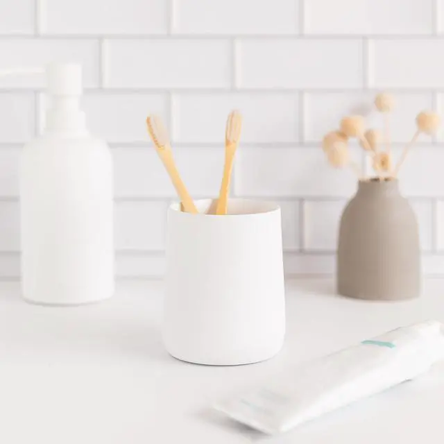 Alt view image 2 of 7 - Matte White Toothbrush and Toothpaste Holder and Cup for Bathroom Vanity and Countertop, Round Organizer for Electric Toothbrushes, Floss, Razors, Cotton, and Mouthwash