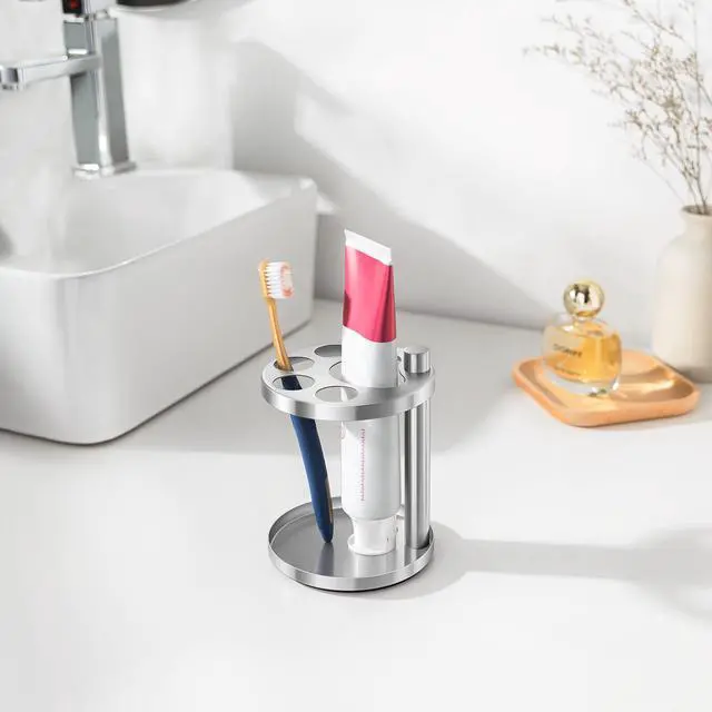 Alt view image 2 of 7 - Stainless Toothbrush Holder Stand for Bathroom: Stainless Steel Ventilated Organizer with Slots for Electric Toothbrushes, Toothpaste, Razors & Small Comb, Unique Footprint Base Design, Brushed Silver