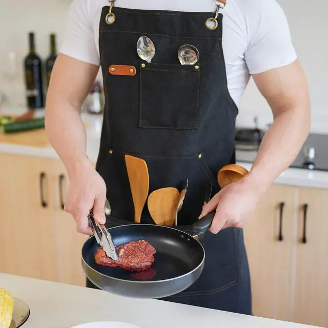 Alt view image 3 of 7 - Canvas Aprons for Men Chef Apron, Work Apron with Large Pockets - Durable 16oz Heavy Duty Cross Back, BBQ, Cooking (Black, 1 Pack)