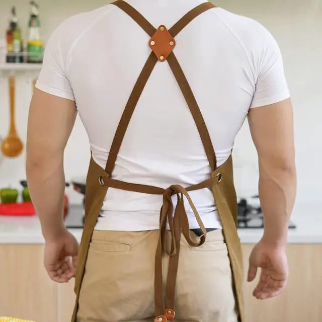 Alt view image 5 of 7 - Canvas Aprons for Men Chef Apron, Work Apron with Large Pockets - Durable 16oz Heavy Duty Cross Back, BBQ, Cooking (Brown, 1 Pack)