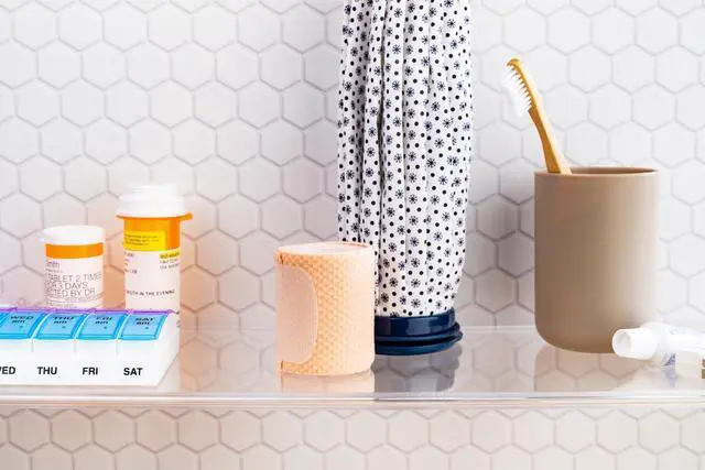 Alt view image 7 of 7 - Ezy Dose Weekly (7-Day) AM/PM Pill Organizer, Vitamin and Medicine Box, Small Pop-out Compartments, 2 Times a Day, Blue and Purple Lids