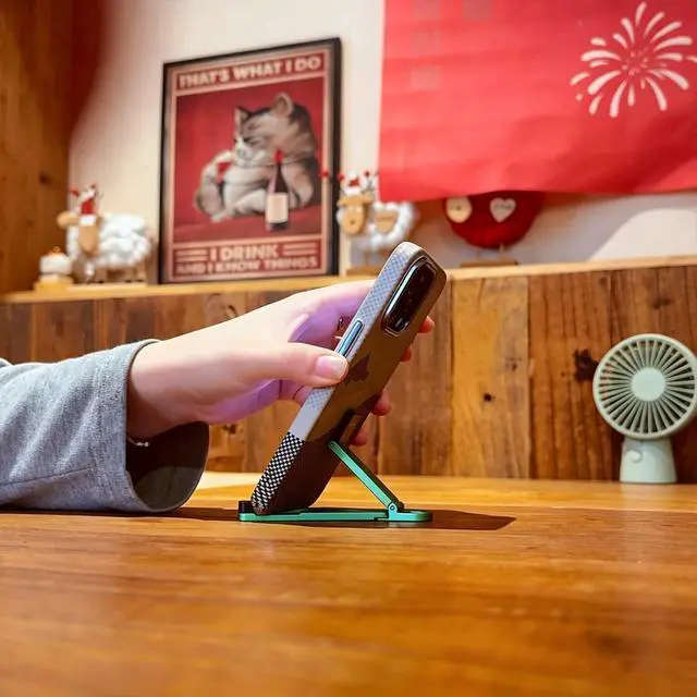 Alt view image 5 of 6 - Portable Foldable Pocket Phone Stand with Keychain for Desk Travel(Green)