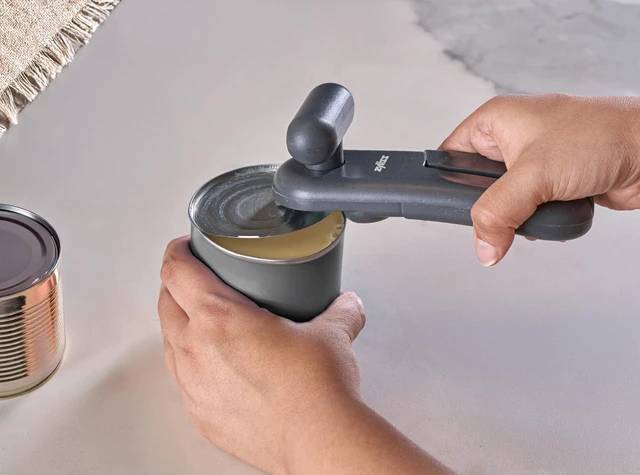 Alt view image 6 of 7 - MagiCan Manual Can Opener with Lid Release - Heavy Duty Can Opener - Easy to Use Hand Held - Effortlessly Open Cans - Compact Design - Black