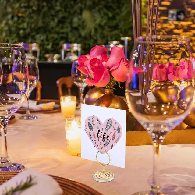 Alt view image 2 of 7 - 30 Pack Gold Table Number Holders with Clear Stable Base Metal Place Card Holders for Table, Photo Picture Stands Card Holders for Wedding Party Banquet Restaurant Events (Gold)