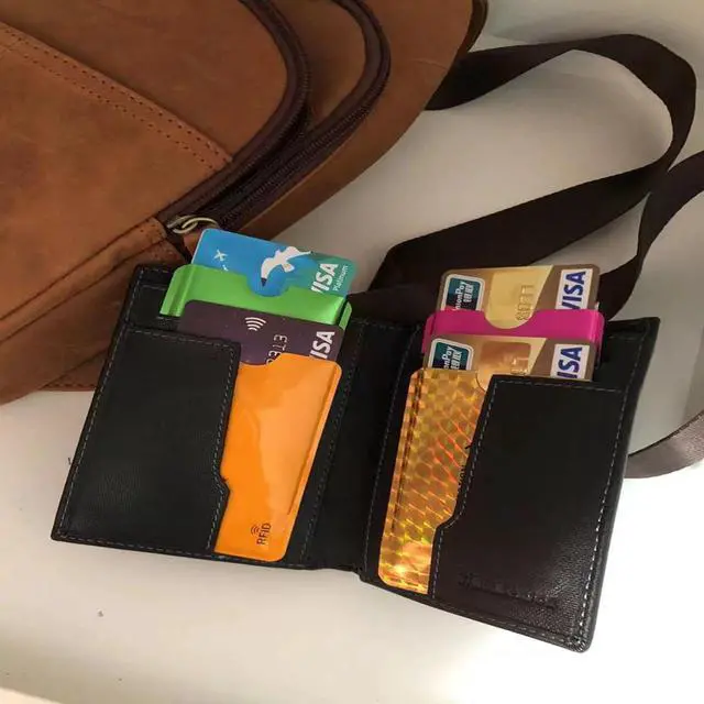 Alt view image 6 of 7 - 16 RFID Blocking Sleeves Set (12 Colorful Credit Card Protector RFID Blocking Sleeve & 4 RFID Passport Holder). Effectively Protect Your Credit, Debit, and ID Cards From Electronic Theft.