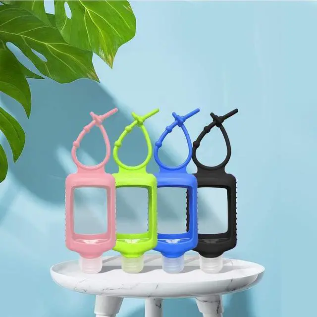 Alt view image 5 of 7 - 4 Pack Travel Size Plastic Clear Bottles w/Silicone Sleeve Refillable Empty Squeeze Containers Leakproof Flip Cap Keychain Bottles Hand Sanitizer Holder for Backpack Travel Outdoor (60ml/2oz)