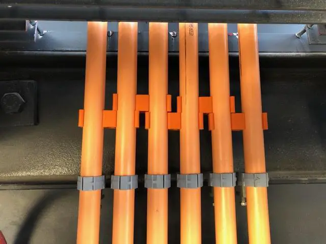 Alt view image 3 of 6 - Rack-A-Tiers Slammers Rigid/PVC Conduit Spacer with Support Hole - 50 Pack (1") (35100.RSWS)