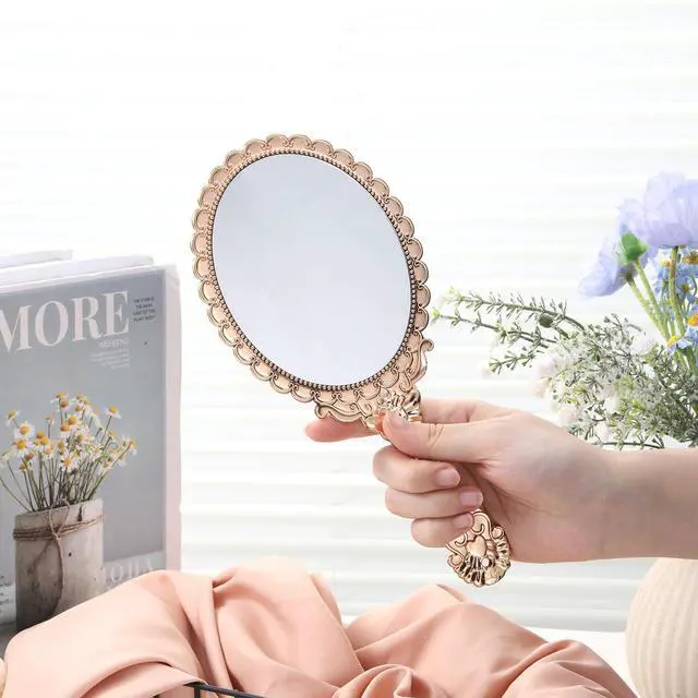 Alt view image 5 of 7 - Vintage Hand Mirror, Portable ABS Vintage Handheld Mirror Rose Gold Embossed Hand Held Mirror Handheld Travel Mirrors for Women Face Makeup Travel Princess Party Favors Gift