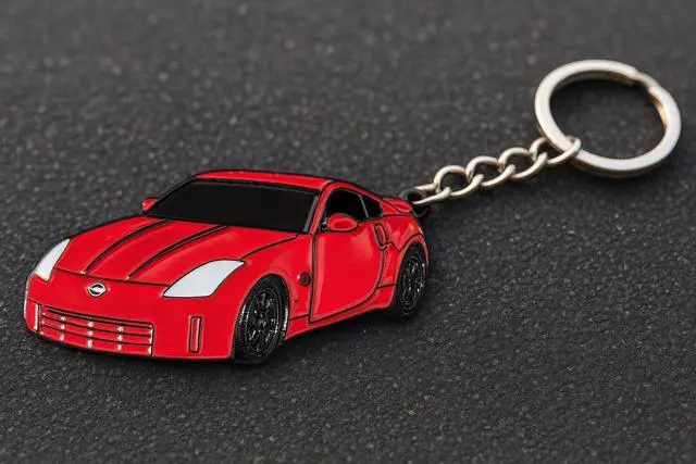 Alt view image 3 of 3 - Sports Car Keychain Collectible Automotive Accessory Compatable With 2003-2009 350Z With Silver Metal Keyring (Red)