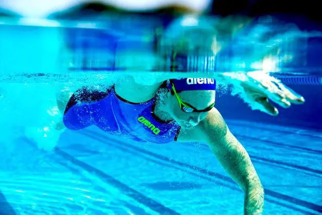 Alt view image 5 of 6 - Tracks Unisex Adult Essential Racing Swim Goggles for Competitive Swimmers FINA-Approved Anti-Fog Coated Non-Mirror Lens, White/Clear/Blue