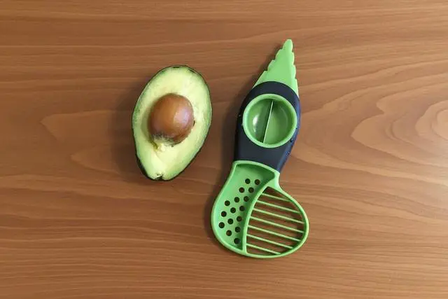 Alt view image 2 of 7 - 3-In-1 Avocado Slicer Peeler Tool, 7.5" x 3"
