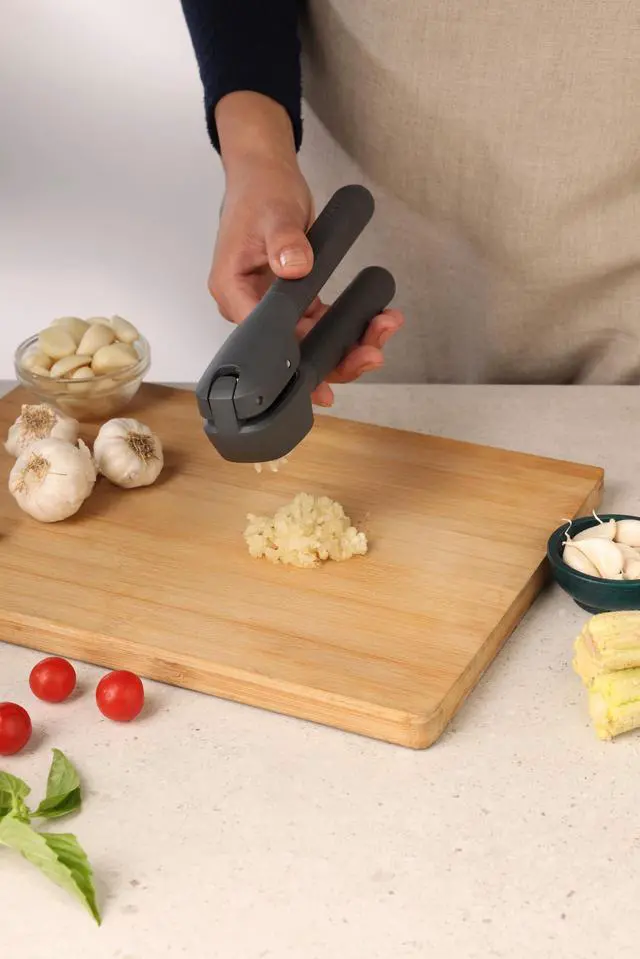 Alt view image 3 of 7 - Classic Garlic Press Heavy Duty Garlic Mincer & Crusher with Large Chamber, Ergonomic Easy Grip Handles, Dishwasher Safe Garlic Press, Stainless Steel Kitchen Tool