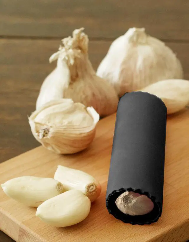 Alt view image 2 of 7 - Premium Garlic Peeler - Silicone Easy Roll Garlic Roller Tube - Sturdy Thick Odor Free Silicone - Removes Garlic Peels in Seconds - Peels Multiple Cloves - BPA Free - Black