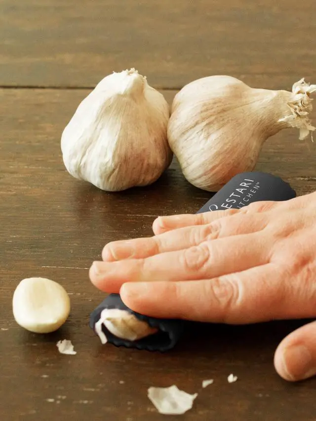 Alt view image 6 of 7 - Premium Garlic Peeler - Silicone Easy Roll Garlic Roller Tube - Sturdy Thick Odor Free Silicone - Removes Garlic Peels in Seconds - Peels Multiple Cloves - BPA Free - Black