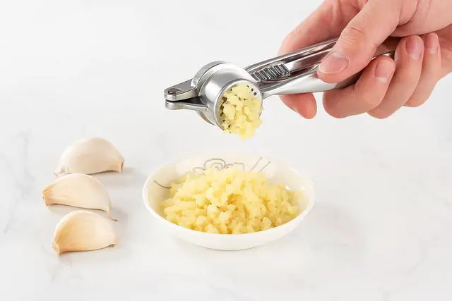 Alt view image 4 of 7 - 3-in-1 Garlic Press, Lemon Slicer & Peeler Set - Rustproof Stainless Steel, Easy-Clean with Soft, Ergonomic Handle