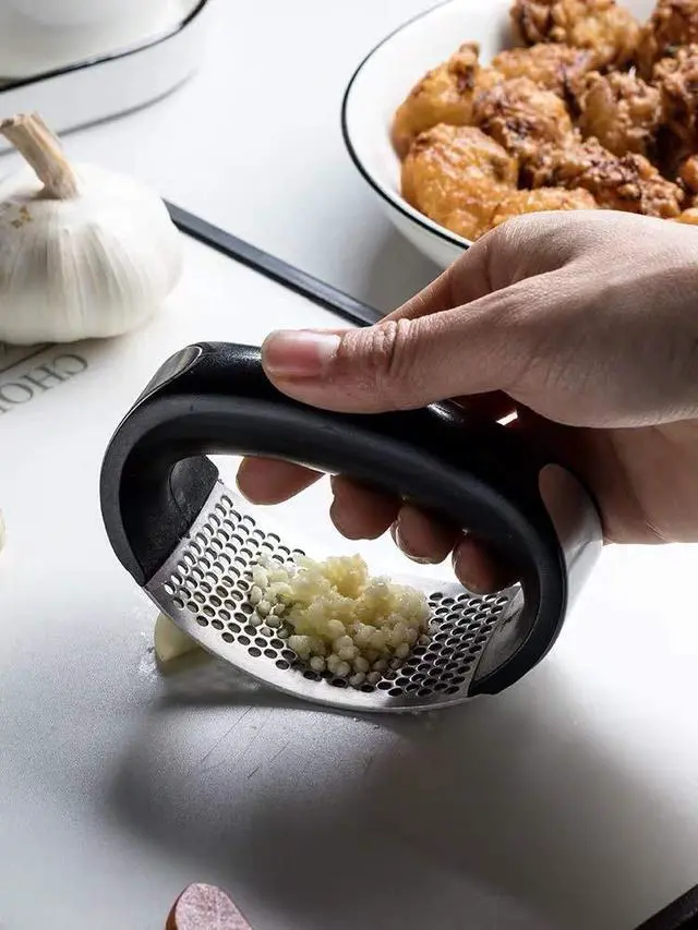 Alt view image 7 of 7 - Garlic press kitchen tool garlic peeler stainless steel professional ginger crusher ergonomic labor-saving crusher (S)