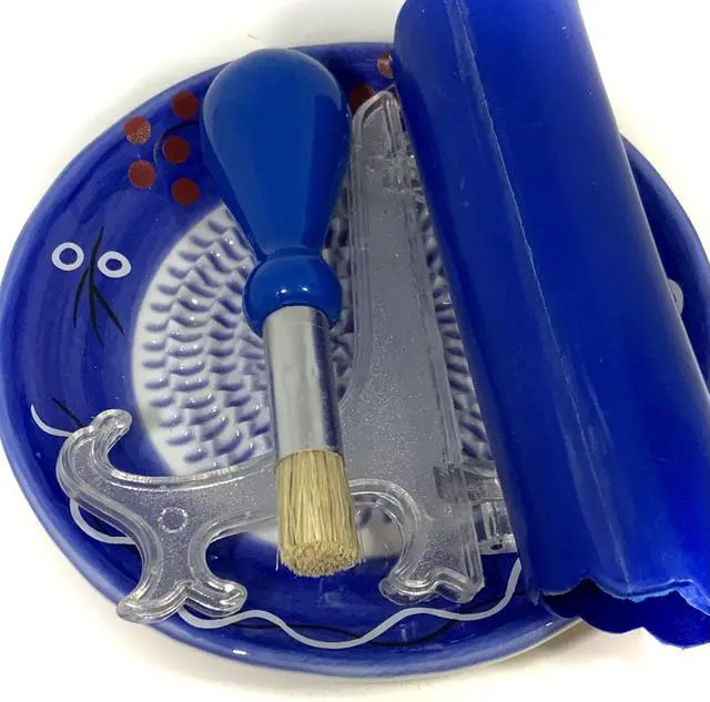 Alt view image 7 of 7 - All-in-one Premium Ceramic Garlic Grater Plate 4-Piece Set - Cherry Line on Blue Design - For Garlic, Ginger, Chocolate, and more! - Comes with 5.25" Plate, Peeler, Brush, and Stand