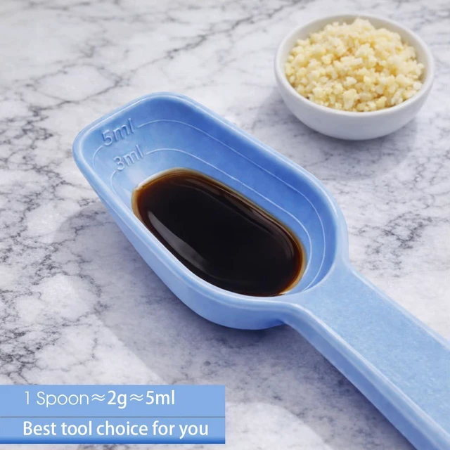Alt view image 4 of 7 - Silicone Garlic Peeler Tube Roller with Brush, 2-in-1 Kitchen Gadget Set, Measuring Spoon with Cleaning Brush (5ml & 3ml) and Silicone Garlic Peeler, Easy-Clean Kitchen Utensils with Hanging Loops