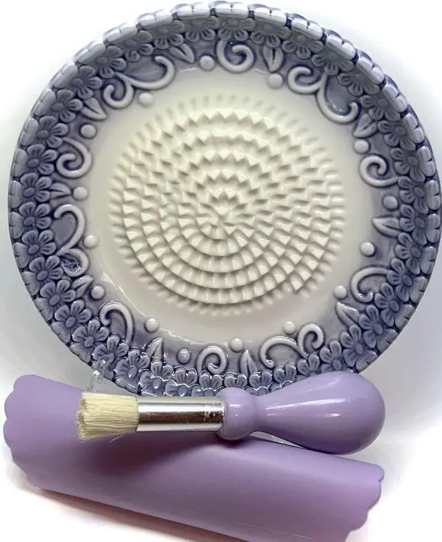 Main image of All-in-one Premium Ceramic Garlic Grater Plate 4-Piece Set - Purple Embossed Design and Style - For Garlic, Ginger, Chocolate, and more! - Comes with 5.25" Plate, Peeler, Brush, and Stand