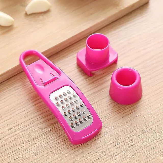 Alt view image 6 of 7 - Multipurpose Garlic Mincer and Garlic Crusher - Easy Squeeze Clean Garlic Press, Dishwasher Safe Sturdy Tool Compact and Portable Design for Extracts More Paste Per Clove - Pink