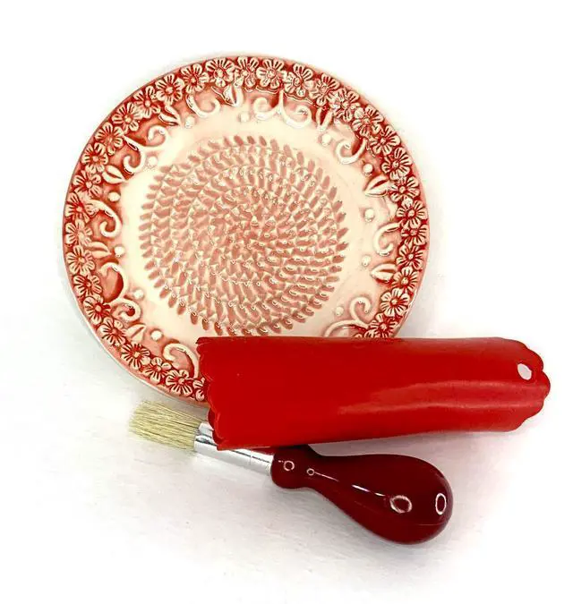 Alt view image 3 of 7 - All-in-one Premium Ceramic Garlic Grater Plate 4-Piece Set - Red Embossed Design and Style - For Garlic, Ginger, Chocolate, and more! - Comes with 5.25" Plate, Peeler, Brush, and Stand