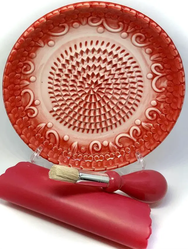 Alt view image 5 of 7 - All-in-one Premium Ceramic Garlic Grater Plate 4-Piece Set - Red Embossed Design and Style - For Garlic, Ginger, Chocolate, and more! - Comes with 5.25" Plate, Peeler, Brush, and Stand