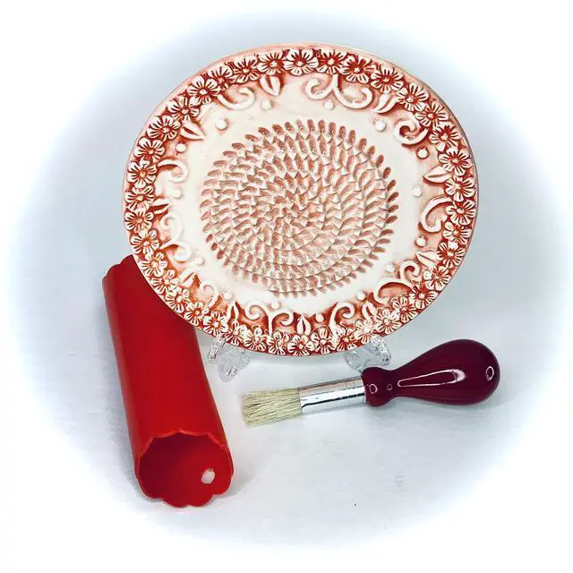 Alt view image 6 of 7 - All-in-one Premium Ceramic Garlic Grater Plate 4-Piece Set - Red Embossed Design and Style - For Garlic, Ginger, Chocolate, and more! - Comes with 5.25" Plate, Peeler, Brush, and Stand