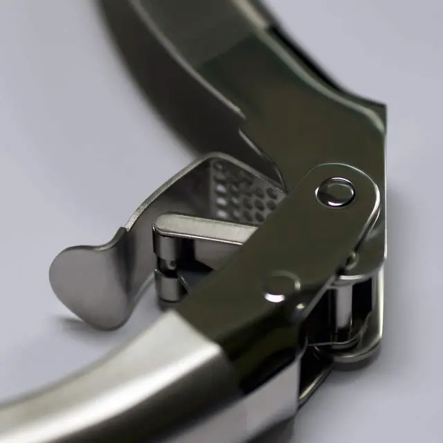 Alt view image 6 of 7 - Stainless Steel Garlic Press, Heavy Duty Professional Grade Double Lever-Assisted Garlic Mincer with High Capacity Reservoir - Easy to Clean and Rust Free Garlic Crusher
