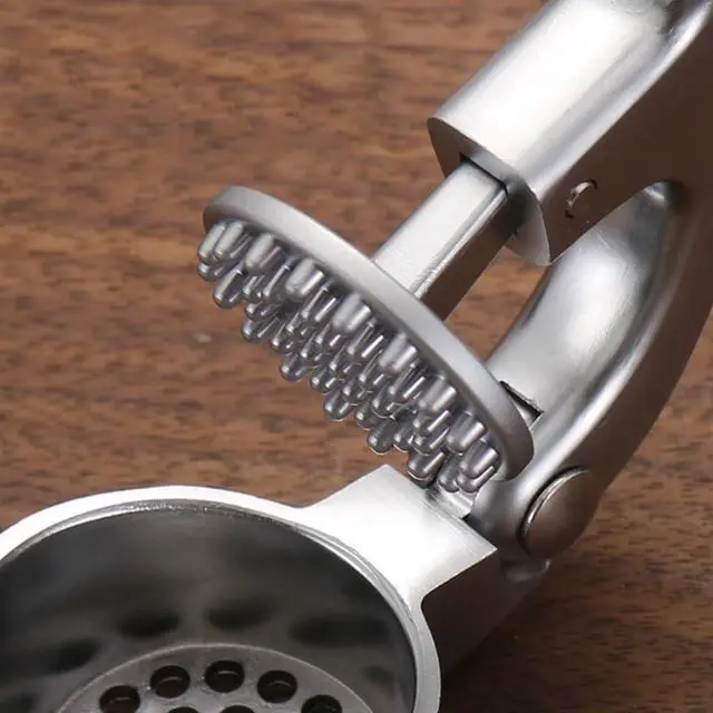 Alt view image 4 of 7 - Garlic Press with Peeler and Brush | Easy Garlic Crusher | Dishwasher Safe | Zinc | Comfortable Handle