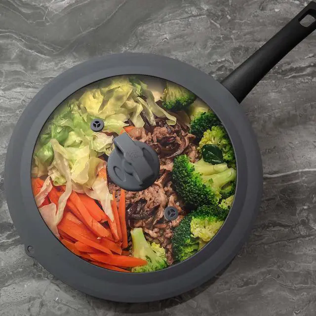 Alt view image 6 of 7 - Vented Tempered Glass Universal Lid for Pot Pan Skillet with Heat Resistant Silicone Rim Microwave Splatter Lid Cover Microwave Safe Fit 11.5" 12" 12.5" Cookware, Dishwasher Safe Grey