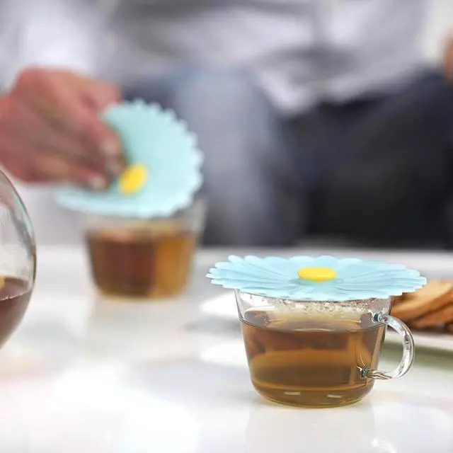 Alt view image 3 of 7 - Set of 2 Daisy 4 Silicone Drink Covers - Airtight Seal on Any Smooth-Rimmed Glass, Keep Drinks Cool or Hot, Protect from Winged Pests - BPA-Free - Oven, Freezer, Dishwasher Safe